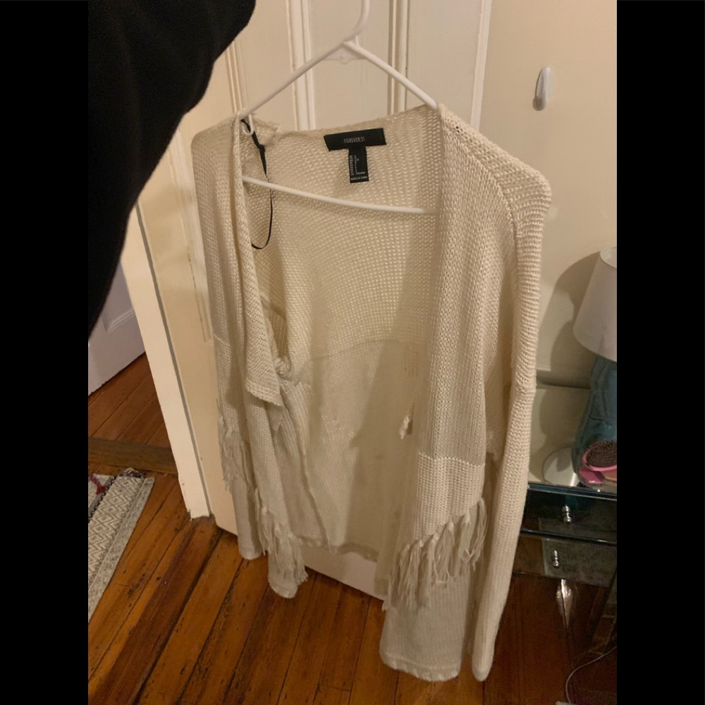 Fringe open face sweater